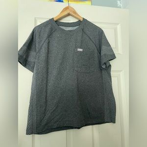 Figs under scrub shirt. Never worn